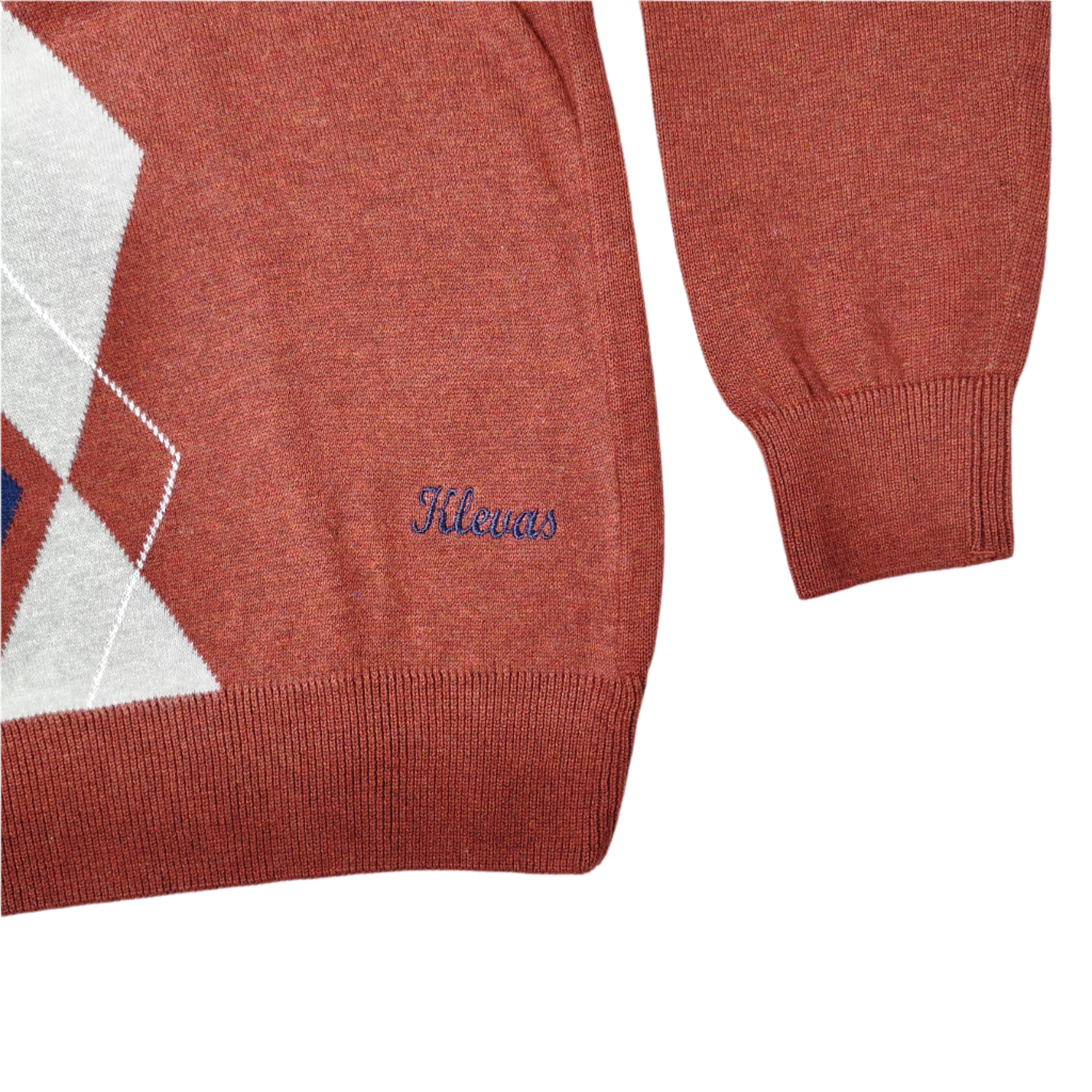 Red sweater with a brand logo on a white background